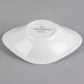 A white Villeroy & Boch porcelain flat bowl with a white rim.