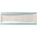 A rectangular aquamarine porcelain plate with a crackle pattern on the rim.