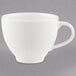 A close-up of a Villeroy & Boch white porcelain cup with a handle.