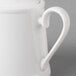 A Villeroy & Boch white bone porcelain sugar bowl with a cover on a white background.