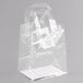 A clear polypropylene bag with soft loop handles.