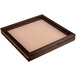 A brown square wooden frame with a white surface.