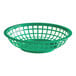 A green plastic round fast food basket with holes and a wire handle.