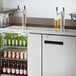 An Avantco stainless steel kegerator with beer taps.