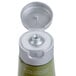 A green Basic Earth Botanicals conditioner bottle with a silver flip-top cap.