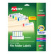 A green and white Avery box of assorted color file folder labels with a printer.