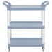 a three tiered blue and silver cart