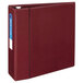 An Avery maroon binder with 4" locking One Touch EZD rings.