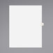 A white rectangular paper tab with a black letter on a white background.