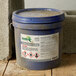 A blue bucket of Avery UltraDuty GHS labels.