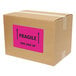 A cardboard box with a pink and black Avery label for 5 1/2" x 8 1/2" Neon Magenta Shipping Labels.