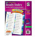 A package of Avery Ready Index dividers with white and blue labels on a purple binder.