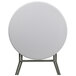 A Flash Furniture white round granite plastic folding table with metal legs.