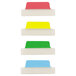 A white surface with green, yellow, and red rectangular Avery Ultra Tabs.