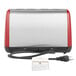 A silver and red KitchenAid toaster with a cord attached.