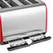 A KitchenAid Empire Red toaster with silver accents and four slots.