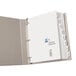 A white Avery binder with white pages and blue tabs.