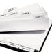 A stack of white file folders with Avery 27-tab dividers labeled A-Z.