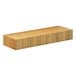 A Cal-Mil bamboo rectangular plate riser with a long, thin edge on a wooden table.