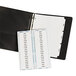 A black folder with Avery white dividers and white label strip.