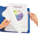 A hand holding a blue Avery file folder with a piece of paper and pie chart.