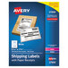 A package of Avery white rectangular shipping labels with paper receipts.