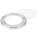 A silver circular object with a clear glass lid.