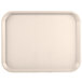 An almond plastic Vollrath fast food tray.