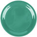 A close-up of a green Carlisle Sierrus melamine pie plate.