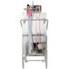 A Jackson TempStar door type dishwasher with pipes and tubes.