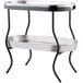 A metal and black Tablecraft beverage tub on a metal table.