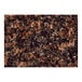 A close up of an Art Marble Furniture tan brown granite tabletop with black and brown spots.