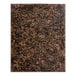 A close-up of a tan brown granite Art Marble Furniture table top with black and brown spots.