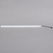 An Avantco LED rectangular light bar with a black wire.