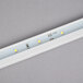 An Avantco LED rectangular light with many small bulbs.