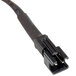 A black cable with a black connector on an Avantco LED light bulb.