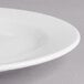 A Villeroy & Boch white porcelain flat plate with a thin rim.