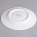 A white Villeroy & Boch porcelain saucer.