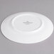 A white Villeroy & Boch porcelain flat plate with a white rim.