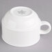 A Villeroy & Boch white porcelain cup with a handle.