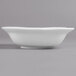 A close-up of a Villeroy & Boch white porcelain square salad bowl.