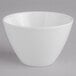 A white Villeroy & Boch porcelain bowl on a gray surface.