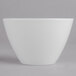 A white bowl on a gray background.