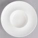 A white porcelain Villeroy & Boch deep plate with a white rim and a hole in the middle.