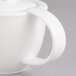 A white Villeroy & Boch porcelain teapot with a lid.