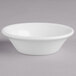 A Villeroy & Boch white porcelain bowl on a grey surface.