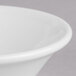 A close-up of a Villeroy & Boch white porcelain bowl with a small rim.