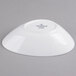 A Villeroy & Boch white porcelain oval deep bowl on a gray background.