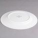 A Villeroy & Boch white porcelain flat plate with a white rim.