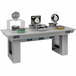 A Bon Chef rectangular induction table with warming stoves and pots on top.